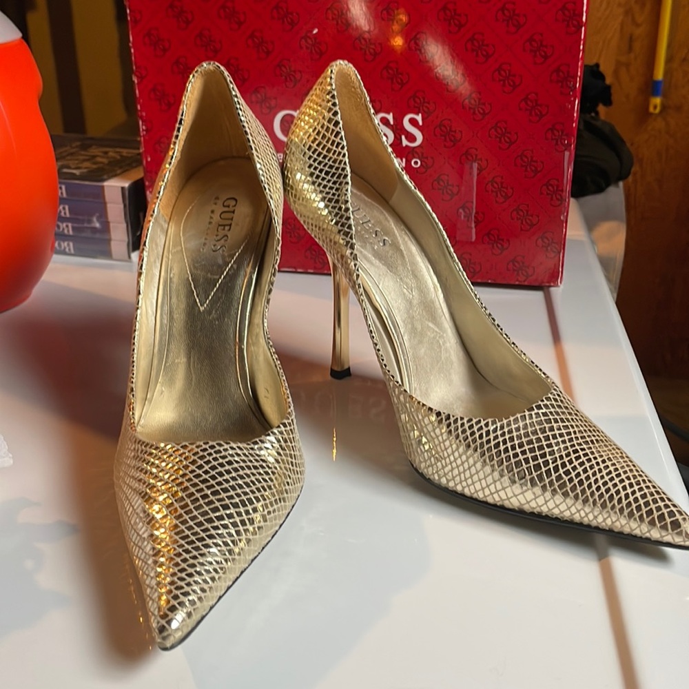 Gold snake skin pumps